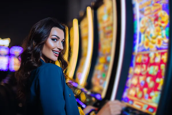 DB9 Casino Games — Enjoy nonstop entertainment A close-up shot of golden coins falling around a spinning roulette wheel, representing immersive casino action at DB9.