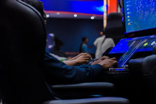 DB9 Jackpot Slots — Spin for massive rewards A dramatic shot of winning sevens landing on a slot reel surrounded by shining gold coins, symbolizing big wins.