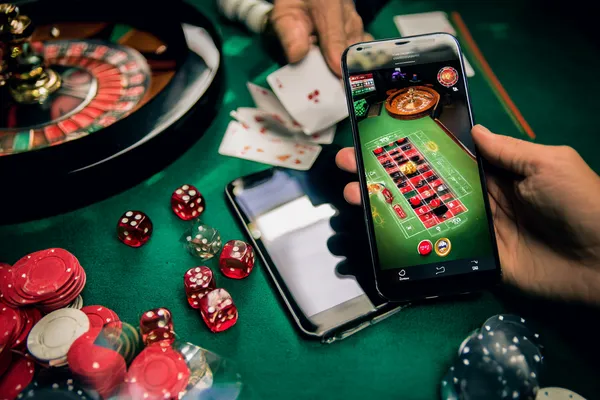 DB9 Member Login — Return to your personalized dashboard A person using their device against a moody casino-themed background, illustrating the smooth re-entry process at DB9.